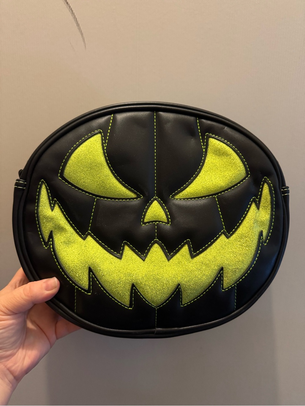 Love Pain and Stitches green and black purse